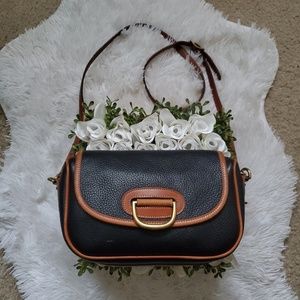 Dooney & Bourke All Weather Leather ®
Porthole Bag